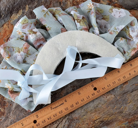 Floral ruffle bib necklace with large clear crystals and satin ribbon ties, vintage-inspired statement jewelry